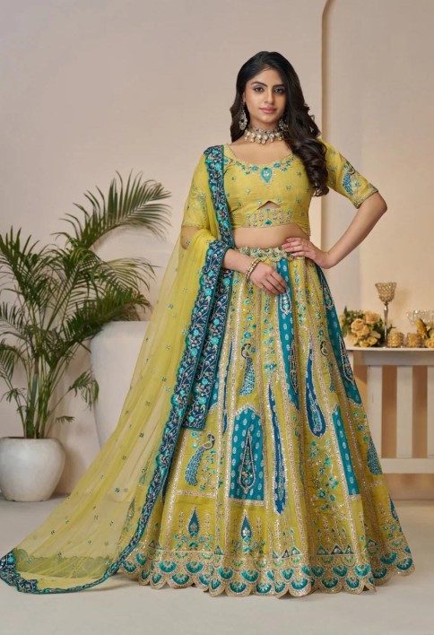Alluring Golden Sangeet Lehenga Choli with Bel Butti Pattern